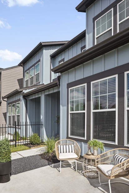 Front Entrance with Gated Front Yards at Camden Woodmill Creek Homes for Rent in The Woodlands, TX