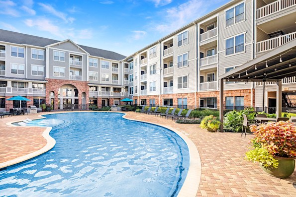 Resort-style swimming at Camden Heights Apartments in Houston, TX