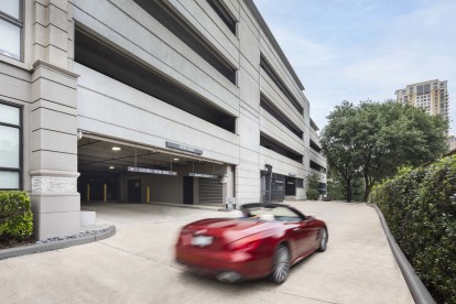 Access controlled covered parking garage at Camden Post Oak Apartments in Houston, Tx 