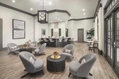 Clubroom with ample seating at Camden Woodson Park in Houston, TX