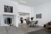 Street level apartment high ceilings studio with wood inspired flooring