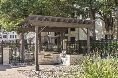 Poolside grills at Camden Huntingdon apartments in Austin, TX