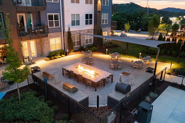 Aerial view of outdoor kitchen at twilight at Camden West Nashville apartments in Nashville, TN