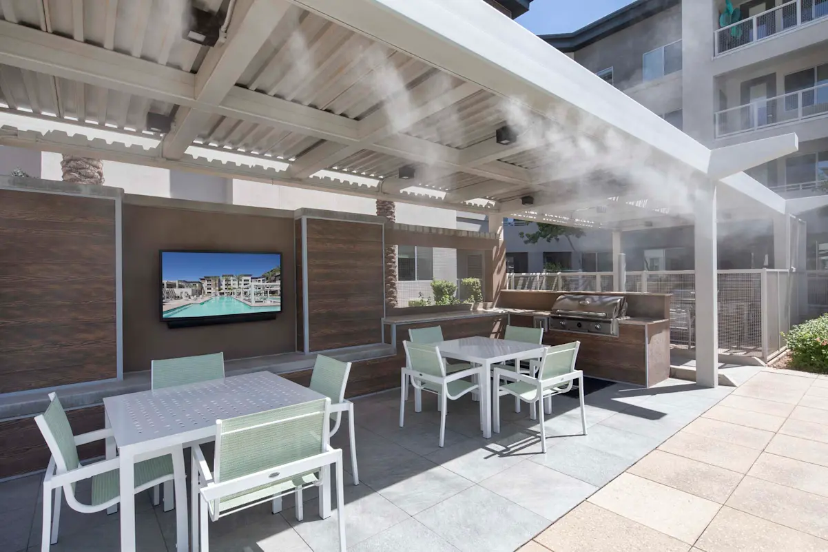 Covered outdoor dining and bar seating at Camden North End.