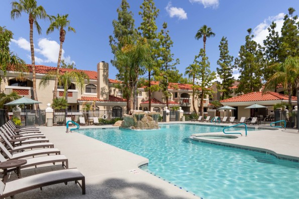 Resort style pool with water feature