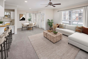Open concept living room and dining room at Camden Lansdowne Apartments in Lansdowne, VA. 