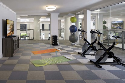 Yoga studio with interactive classes and spin bikes