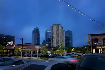 Uptown park shopping and dining near community at night