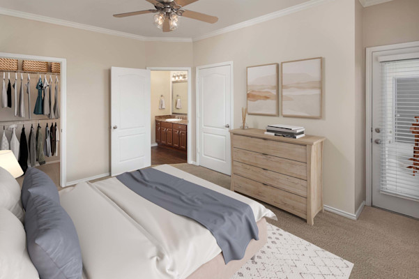 Bedroom with carpet, walk-in closet, ensuite and patio access at Camden Legacy Creek