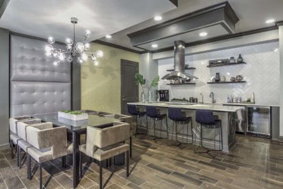 Resident lounge with large entertaining kitchen at Camden Asbury Village in Raleigh, NC