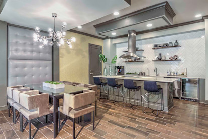 Resident lounge with large entertaining kitchen at Camden Asbury Village in Raleigh, NC