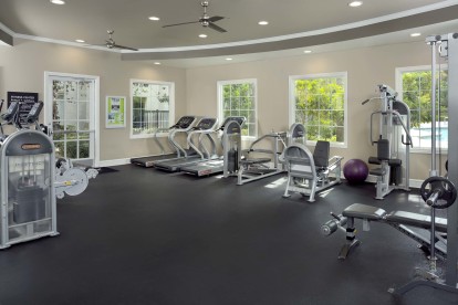 Camden Landmark fitness center with ceiling fans and cardio equipment 