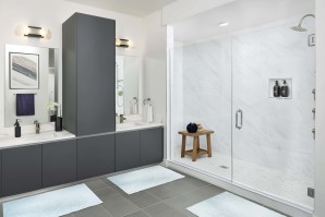 Penthouse bathroom with modern gray finishes, double sink, and walk-in shower at Camden Buckhead in atlanta GA