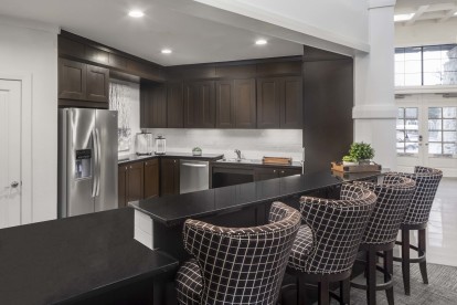 Resident lounge with entertaining kitchen at Camden Yorktown Apartments in Houston, TX