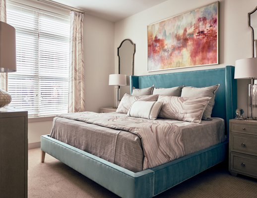 A designer apartment bedroom at Camden Carolinian 
