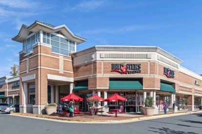 Shopping center with ice cream shop near community