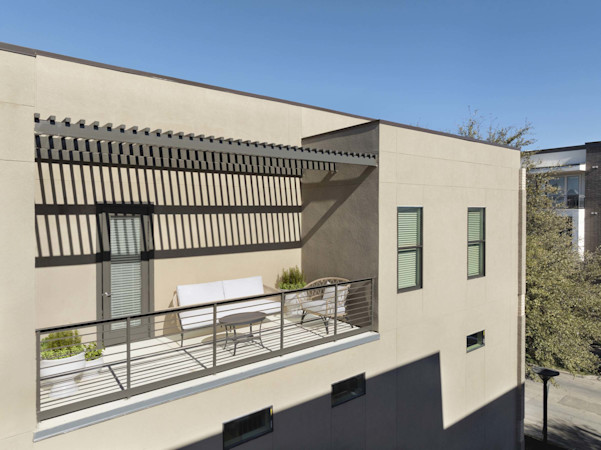 Townhome top-floor balcony at Camden Belmont apartments in Dallas, TX