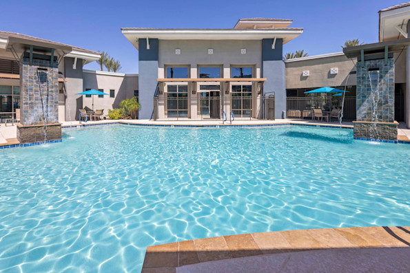 Pool 1 with water feature towers at Camden Chandler apartments in Chandler, AZ