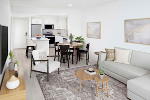White contemporary living room with hardwood-style flooring at Camden Grandview in Charlotte, NC