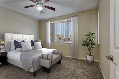 Two bedroom main bedroom with ceiling fan