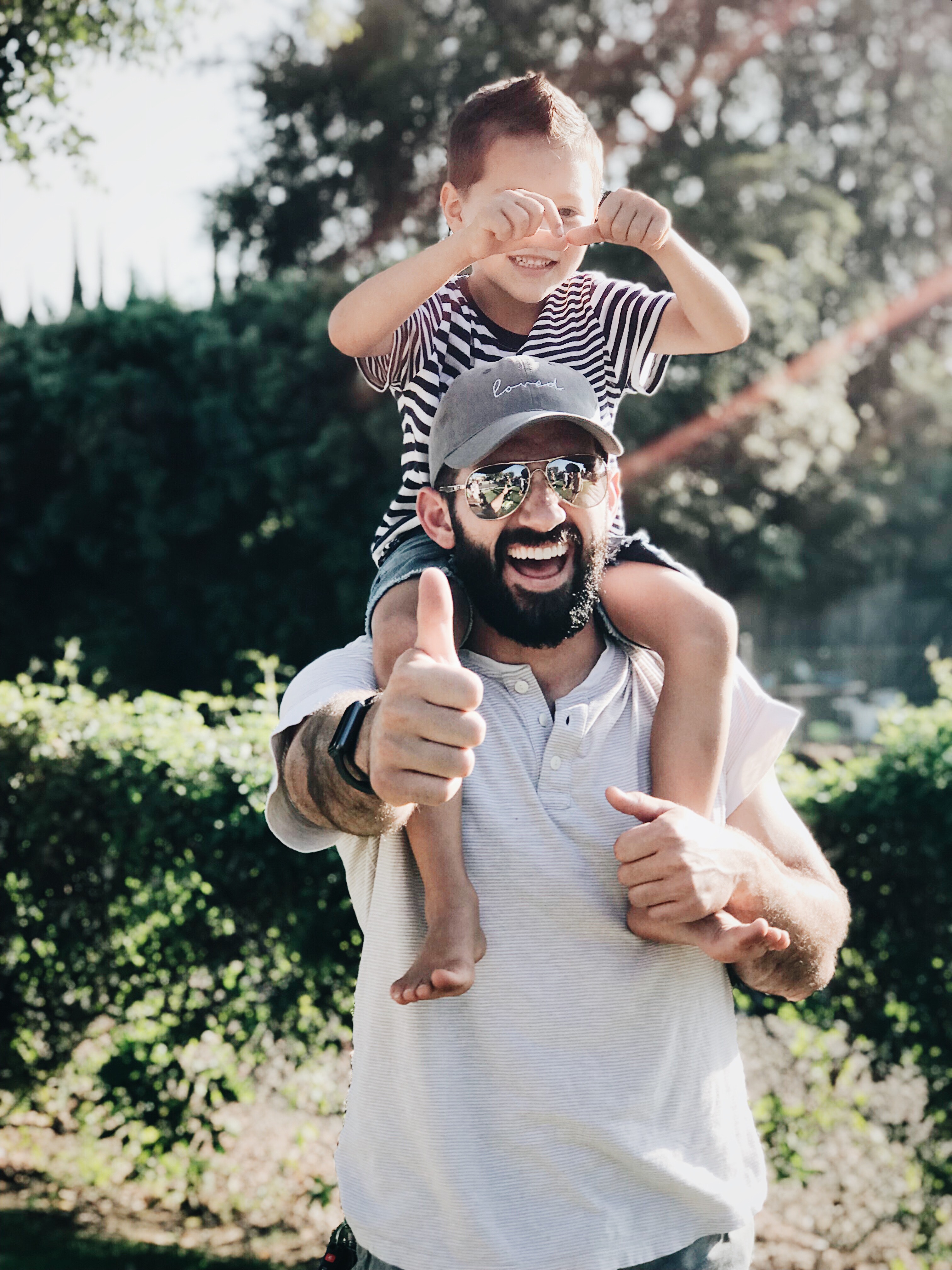 Photo from Pexels https://www.pexels.com/photo/man-carrying-his-son-over-the-shoulders-1456951/
  dad-kid-fun-play
