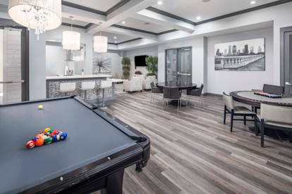 Resident Lounge with billiards and poker tables at Camden City Centre Apartments in Midtown Houston, Tx