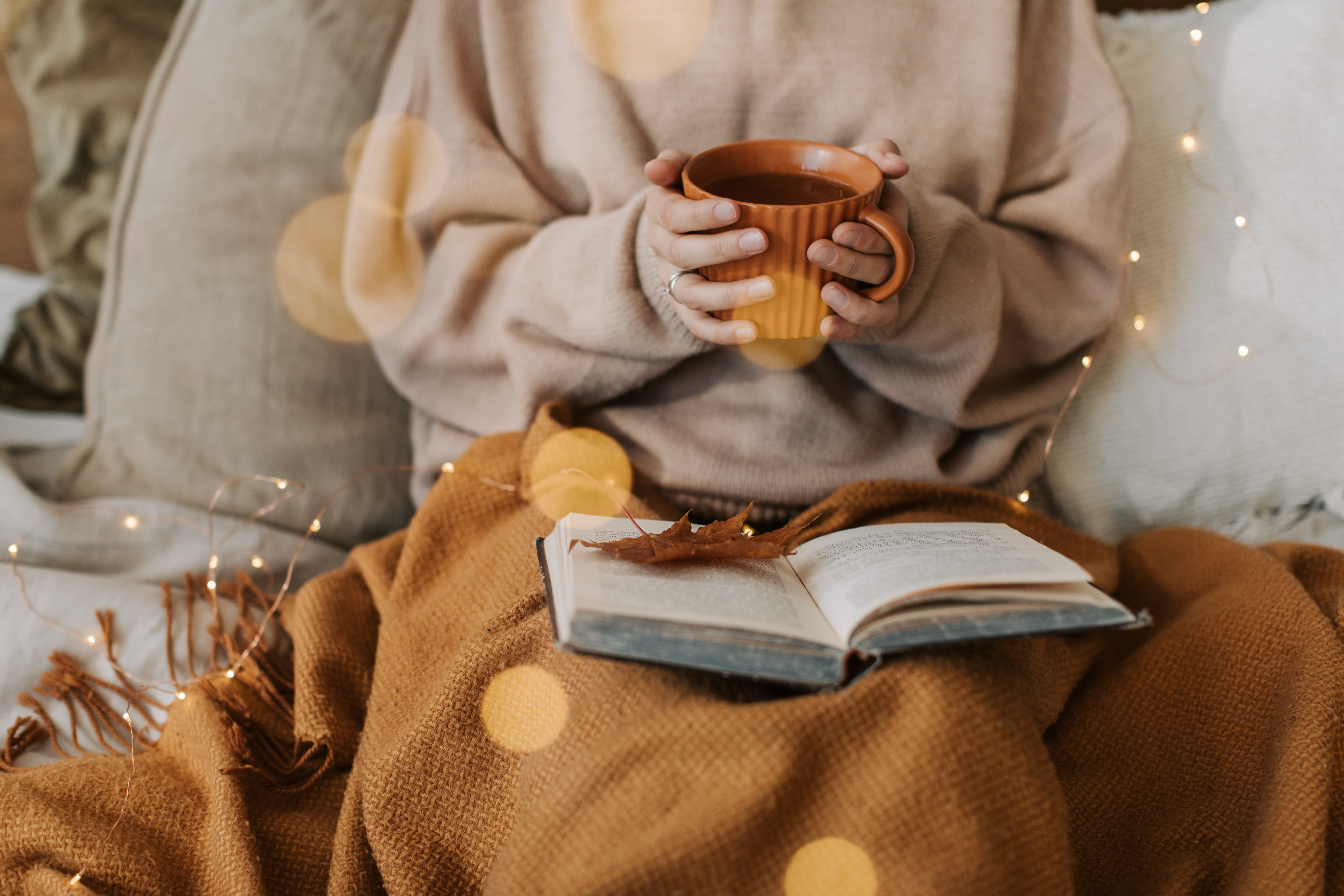 Photo by Vlada Karpovich: https://www.pexels.com/photo/person-in-beige-sweater-holding-a-cup-of-warm-beverage-9969149/