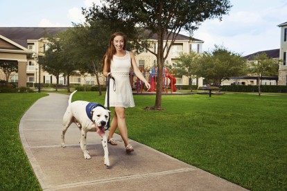 Pet-friendly apartments with walking trails and plenty of green space