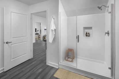 Camden Tempe apartments Tempe Arizona Live Work bathroom with glass-enclosed shower and shower niche