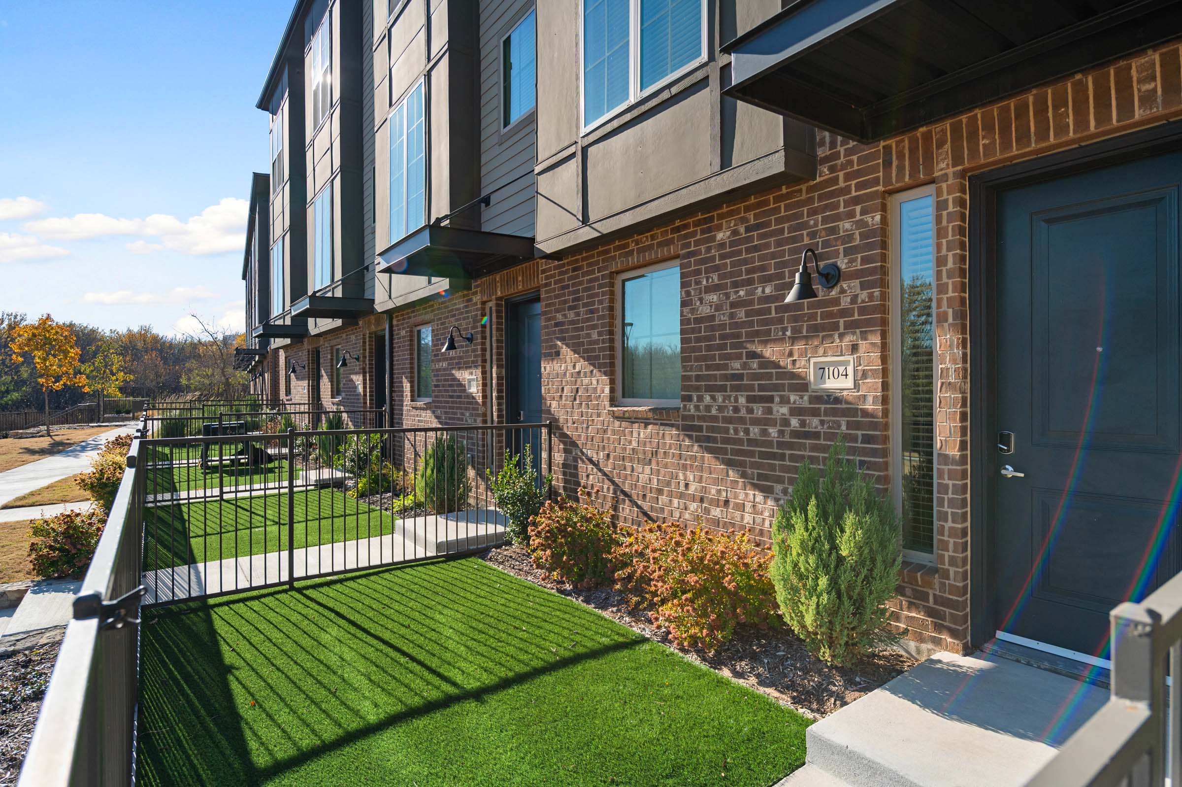 Townhome private turfed front yard at Camden Roanoke apartments in Roanoke, TX