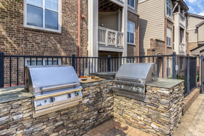 Grilling area next to resort-style pool at Camden Ballantyne in Charlotte North Carolina