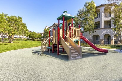 Private playground near grass park