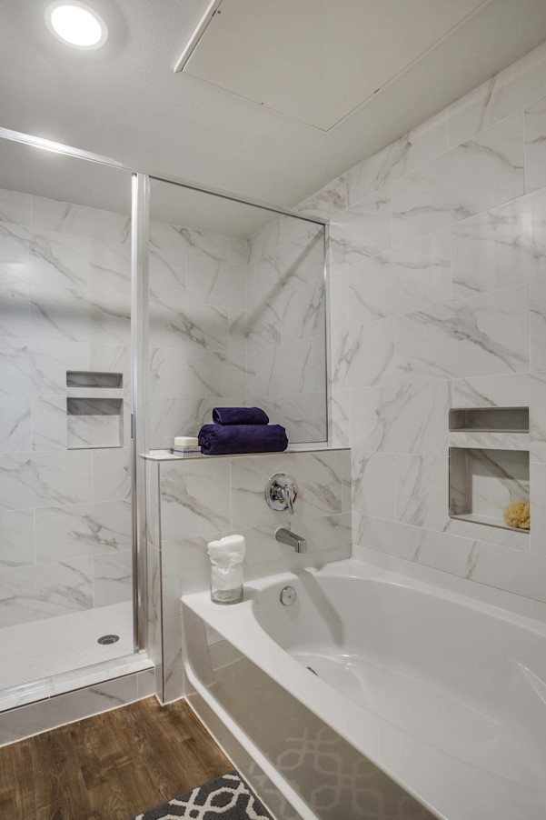 Villas bathroom tub and walk-in shower