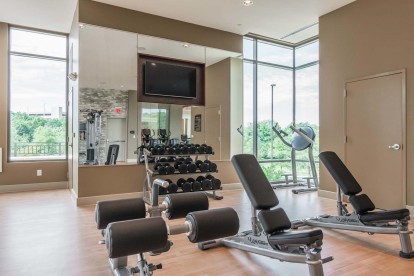 Fitness center with strength training benches and free weights