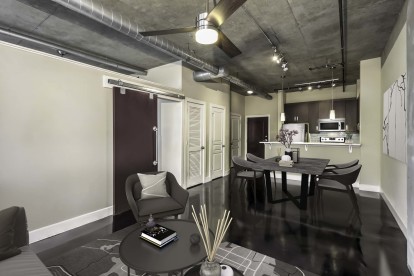 Open concept floor plan with concrete flooring and exposed air ducts