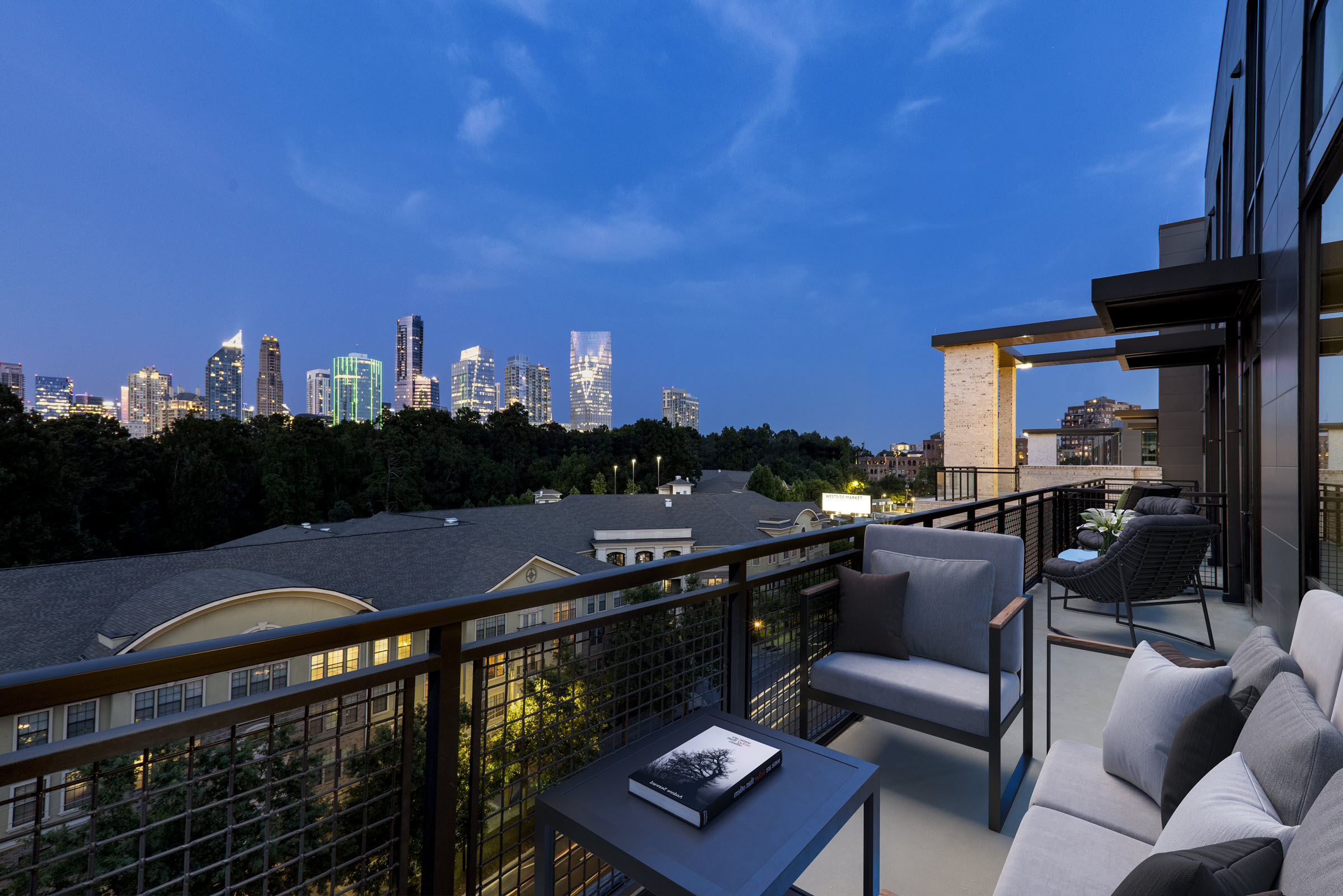 Penthouse apartment balcony with city skyline views