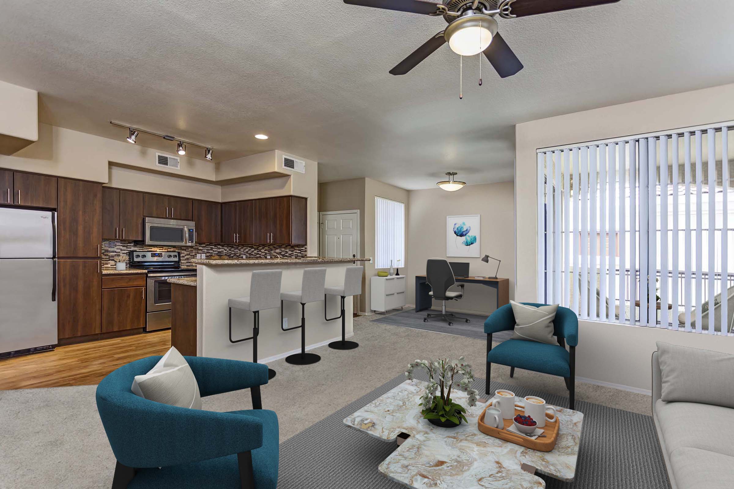 Camden Montierra Apartments Scottsdale AZ spacious open concept living room with ceiling fan near luxury kitchen and a space for a home office
