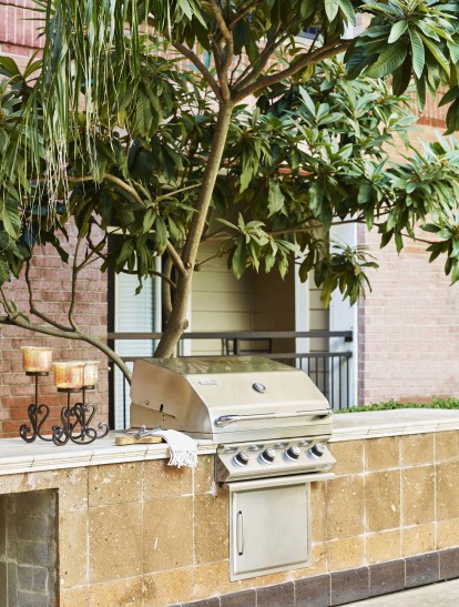 Poolside barbeque grills at Camden Plaza Apartments in Houston, TX 