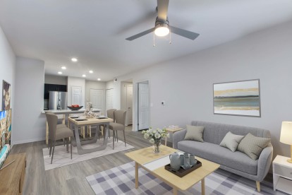 Open concept living and dining room with ceiling fan