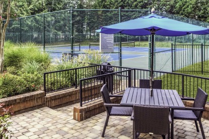 Onsite tennis courts and outdoor dining area