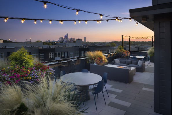 Camden NoDa apartments in Charlotte sky lounge at sunset