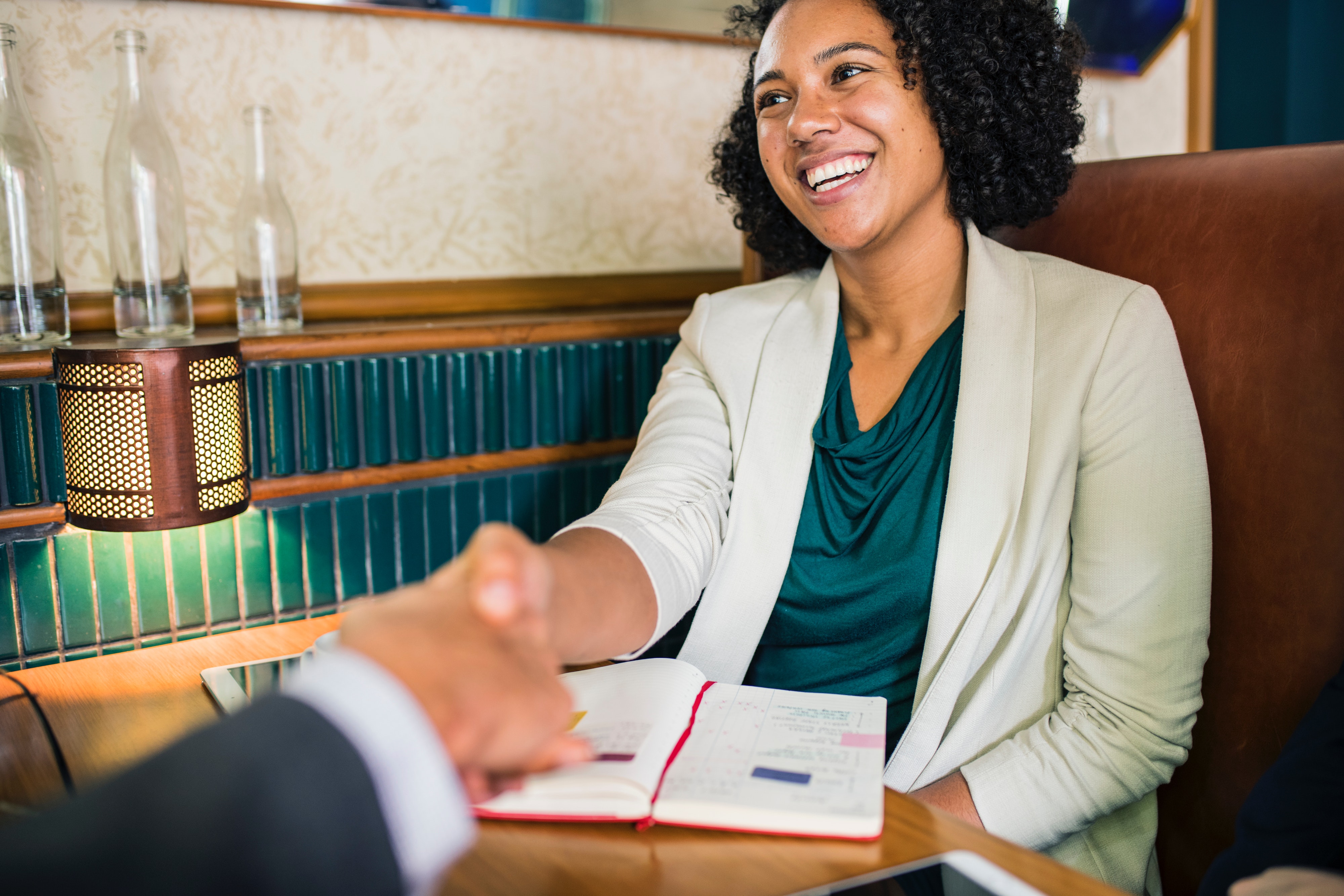 businesswoman-cheerful-collaboration-handshake