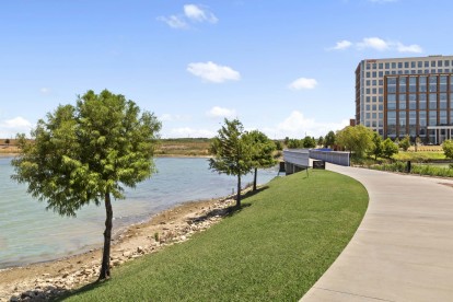 Lakeside walking path at Cypress Waters near Camden Cimarron apartments in Irving, TX
