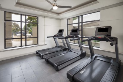 24 hour fitness center with treadmills at Camden Post Oak Apartments in Houston, Tx