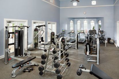 Fitness Center with Cardio and Strength Training Equipment.