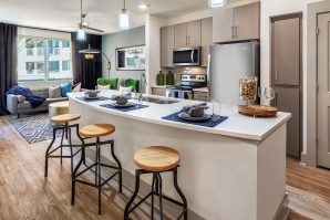 Contemporary style kitchen island stainless steel appliances barstool seating