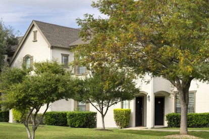 Building exterior view with greenspace