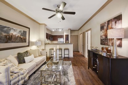 Open concept floor plans with wood-style flooring at Camden Midtown Apartments in Houston, TX