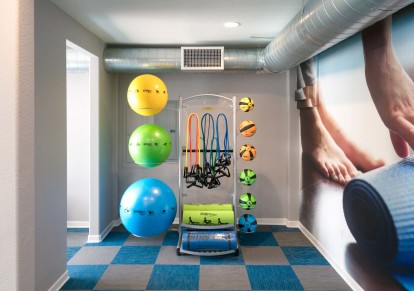 Fitness center with stability balls and strength training bands