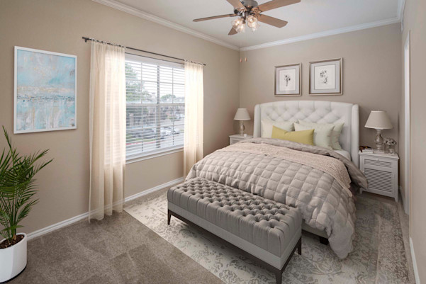 Bedroom with window and ceiling fan